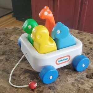 Little Tikes White Pull Wagon with Blue Wheels and Multicolor Animal Pegs